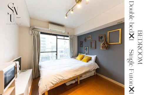 Dotonbori Apartment | 402 道頓堀側のお部屋 中心地へのアクセス抜群 ダブルベッド1台