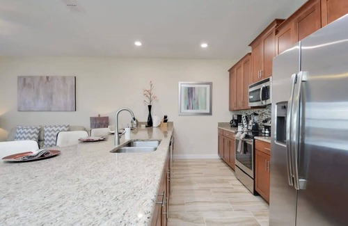 Kissimmee House | 4807- 4‑Bed Family Townhome + Private Pool at Storey Lake