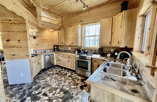 Central Lake House | 4bd/5ba Luxe Log Cabin - Sunset View of Torch Lake, Hiking Trails, Premier Golf