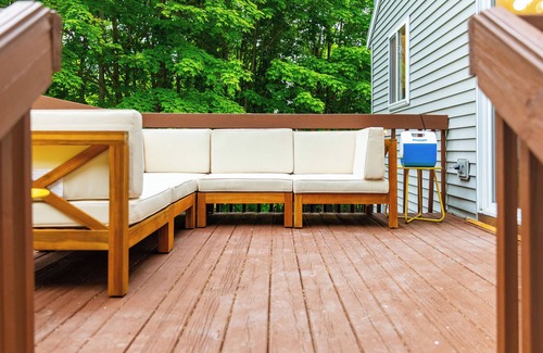 Traverse City House | 4bdr 2 bath house. Unwind in the hot tub, chat around the fire pit and disc golf