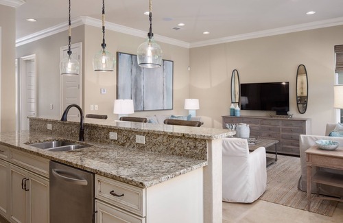 Villa Lago House | 4BR Beach Villa w/2 GOLF CARTS! Near Pool & Wharf. Beach Tram. Covered Patio