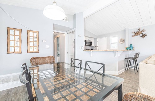 Balboa Peninsula Condo | 4BR Coastal Getaway between the Bay & Beach | Sunny Patio & Balcony!