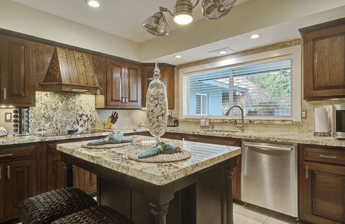 Coral Ridge House | 4BR Heated Pool Home with Tiki Hut!