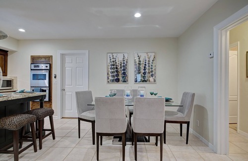 Coral Ridge House | 4BR Heated Pool Home with Tiki Hut!