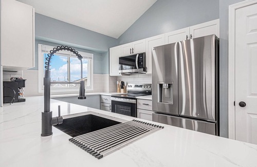North Central Omaha House | 4BR Home With Dedicated Workspace & Wi-Fi