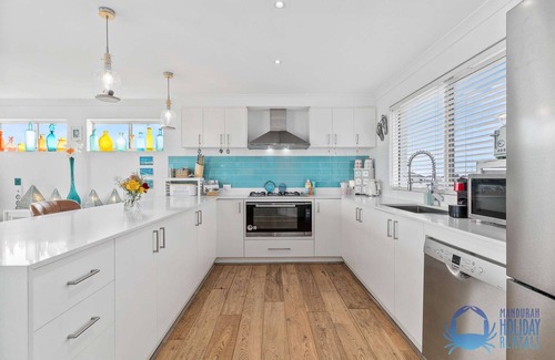 Halls Head House | 4BR Luxury Living with Breathtaking Ocean Views