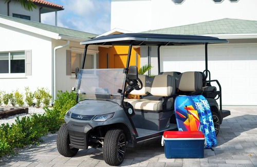 Indian Rocks Beach House | 5 Bed WTFT heated pool dock 6 seat golf cart