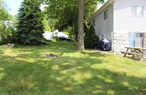 Colon House | 5 Bedroom Home with 100 Feet of Sandy-Bottom Frontage on All-Sport Palmer Lake!