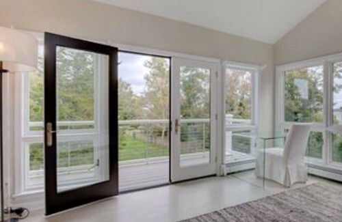 Southold House | 5 Bedrooms ~ Steps from a Private Sandy Beach and Beautiful Vineyard Views.