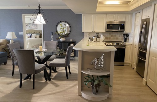 Pelican Bay Condo | 5 min walk to private beach with access to restaurant, bar and beach chairs.