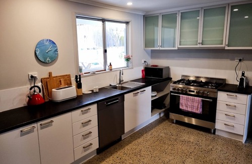 Falcon House | 5 minutes walk to the beach from this family beach house.