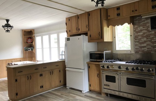 Eagle River House | 5 star on CATFISH LAKE wet boathouse, sandy beach, 5 bedroom, air cond