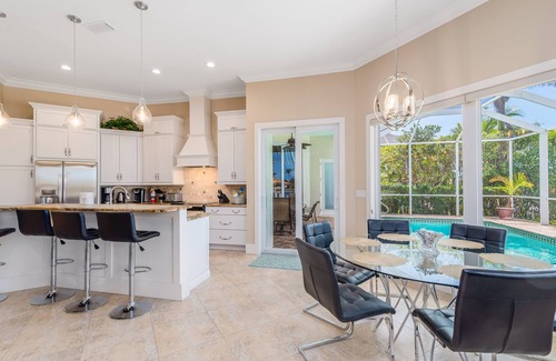 Marco Island House | 5 Star Property! Sleeps 10! Large waterfront model pool home on large Bay!