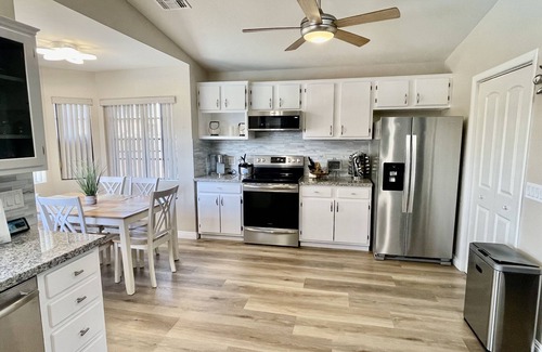 Peoria House | 5 star resort 4 bedroom, 3 bath,heated pool/spa, putting green,7 flat screen tvs