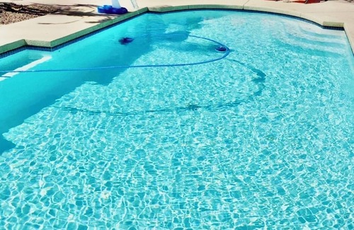 Peoria House | 5 star resort 4 bedroom, 3 bath,heated pool/spa, putting green,7 flat screen tvs