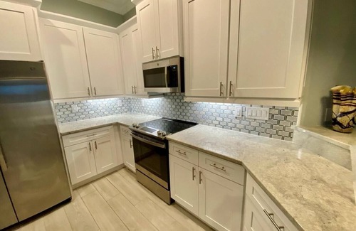 Whitney Beach Condo | 5 Star Resort Style Luxury Condo top floor bay views 3 miles to Beach