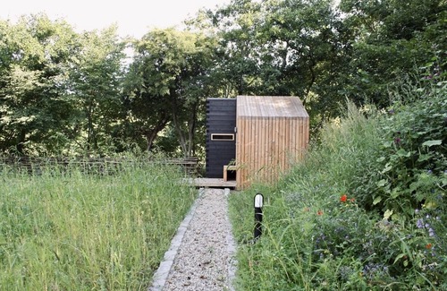 Rodenas House | 5* thatched roof house Ziegelmacher Achten 6600sqm natural garden with pond and outdoor sauna