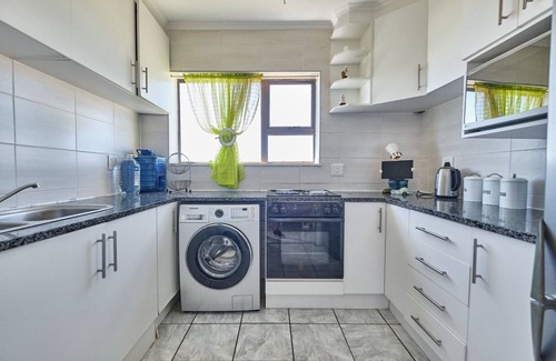 Amanzimtoti Apartment | 504 Amazibu Holiday , a minute's walk to a beautiful beach
