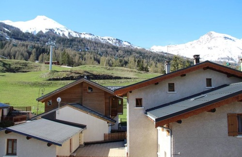 Lanslevillard Apartment | 50m from ski slopes, 3rd floor, view mountain, balcony, parking, tv, ski locker, 55m², Val Cenis