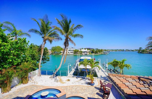 Indian Rocks Beach House | 5BR/6BA Waterfront Pool/Spa (2) 6-pass golf carts