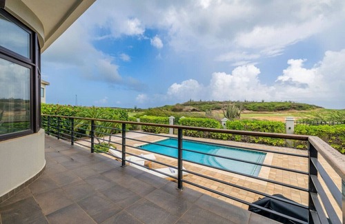 Malmok Villa | 5BR w/Private Pool, Balcony, Deck & Scenic Views at La Colina 11 by Bocobay