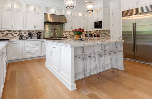 Shinnecock Hills House | 6,400 square foot traditional-style home with a private pool and sweeping...