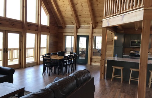 Gilbertsville Cabin | 6 Bedroom Waterfront Log Home with EV charging!