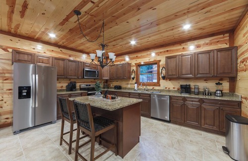 Caton Cabin | 6 King Master Suites, Large Pool, Grill, Hot Tub, Game Room and Theater!