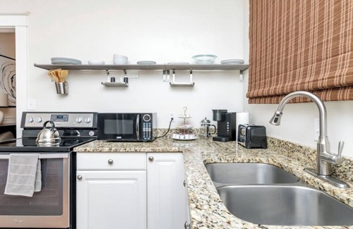 Bonnycastle House | 6BR Retreat w/Game Room Epic Yard Hot Tub Fire Pit