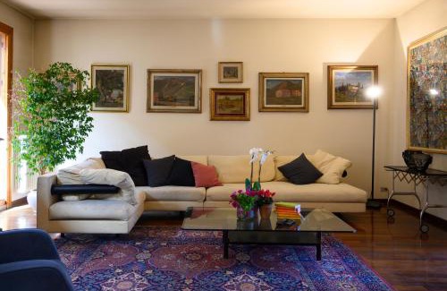 Pistoia Apartment | 70's Design penthouse with terrace