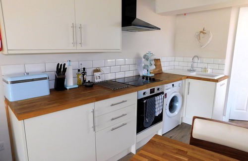 Sheringham Cottage | 73 Beeston Common - traditional brick and flint end terrace cottage has been renovated.