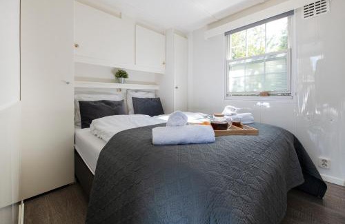 Oisterwijk Ski Chalet | 73, ponds - Kampina - Cycling - Airco - Tranquil! - Recreational Only