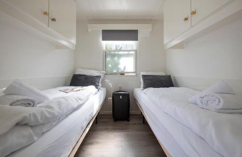 Oisterwijk Ski Chalet | 73, ponds - Kampina - Cycling - Airco - Tranquil! - Recreational Only