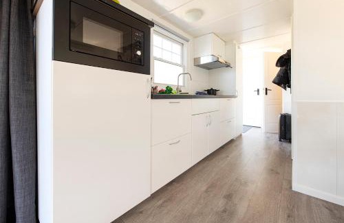 Oisterwijk Ski Chalet | 73, ponds - Kampina - Cycling - Airco - Tranquil! - Recreational Only