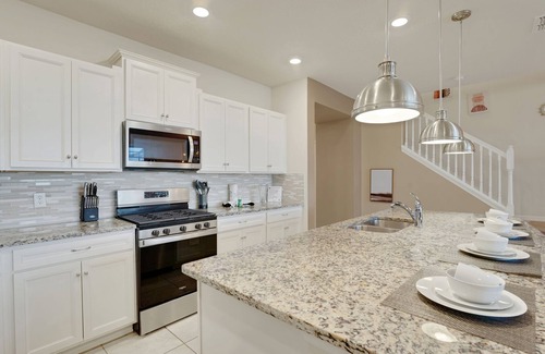 Loughman House | 7589OSL-Spacious 5BD townhouse in Solterra Resort, Davenport, perfect for 10 guests.