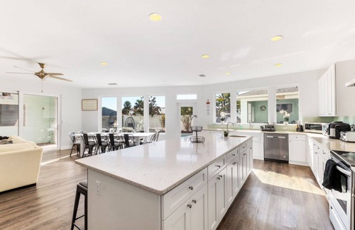 Butler Beach Apartment | 7BR/6.5BTH Beach House | Sleeps 24 | Heated Saltwater Pool, Hot Tub, Pets OK