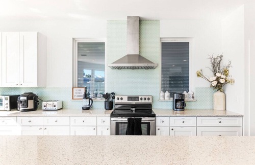 Butler Beach Apartment | 7BR/6.5BTH Beach House | Sleeps 24 | Heated Saltwater Pool, Hot Tub, Pets OK
