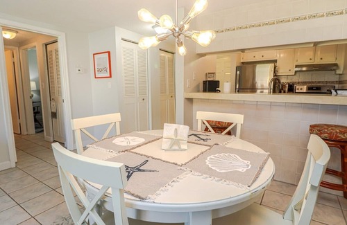 Butler Beach Apartment | 9A Creston House Pool Side Beauty