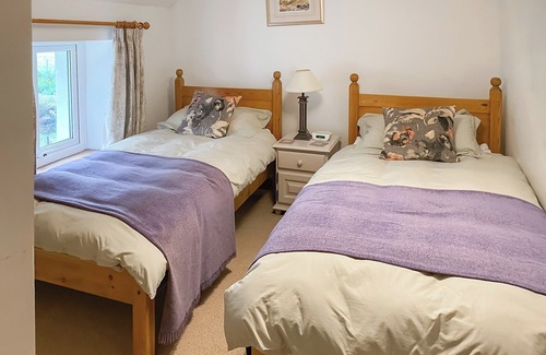 Keswick Cottage | A 17th century cottage nestling in the foothills of the Skiddaw range.
