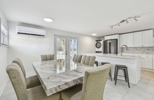 Madeira Beach Cottage | A 2 BR, 2 BA Downstairs Unit right across the street from John's Pass Village!