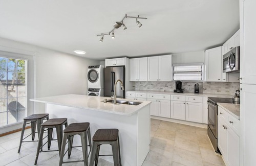 Madeira Beach Cottage | A 2 BR, 2 BA Downstairs Unit right across the street from John's Pass Village!