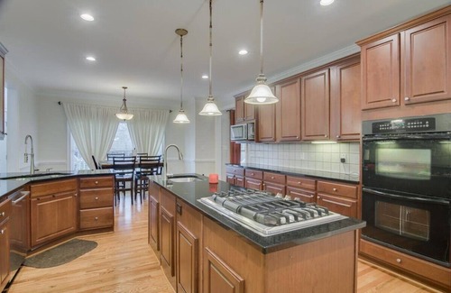 Evans House | A 4500 sq ft, Alexa dots throughout the home. Only 20 minutes from the Masters,