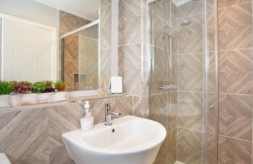 Truro Cottage | A beautiful lodge, nestled tranquilly within a well-regarded park in North Cornwall.