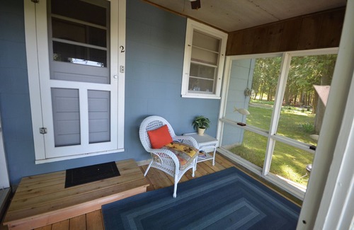 Maple City House | A beautiful resort cottage on Big Glen Lake with a tennis court and kayaks