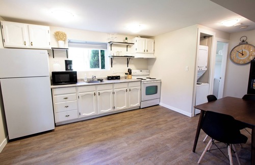 Departure Bay Apartment | A bright and cozy 1-bedroom basement suite is nestled in a lush garden setting