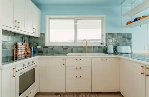 Surf Beach House | A colourful coastal getaway!