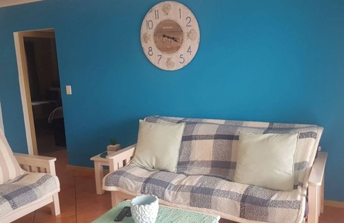 Hartenbos House | A comfortable livingroom, fully equipped kitchen make you feel at home apartment