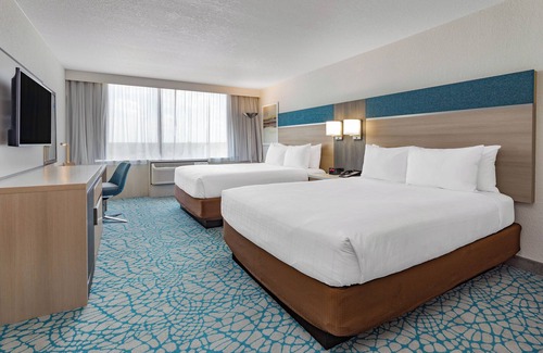 Florida Central Atlantic Coast Hotel | A Dream Stay Awaits! 2 Stunning Rooms | Free Shuttle to Local Attractions