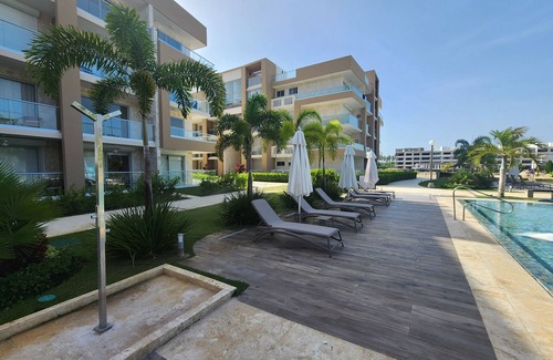 San Pedro de Macoris Apartment | A dreamy vacation apartment, steps from private beach.