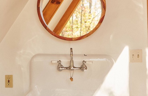 Lake Ariel Cabin | A-frame with beautiful soaker tub over looking the treesn